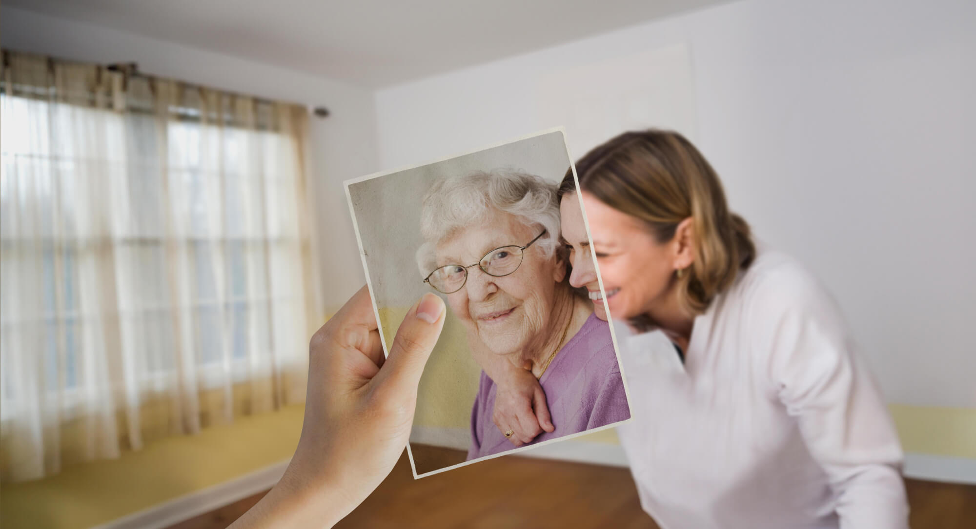 A younger woman appears to have her arm around an older woman. Looking closer, we notice the older woman is in fact in a photograph held in position by an unseen viewer.